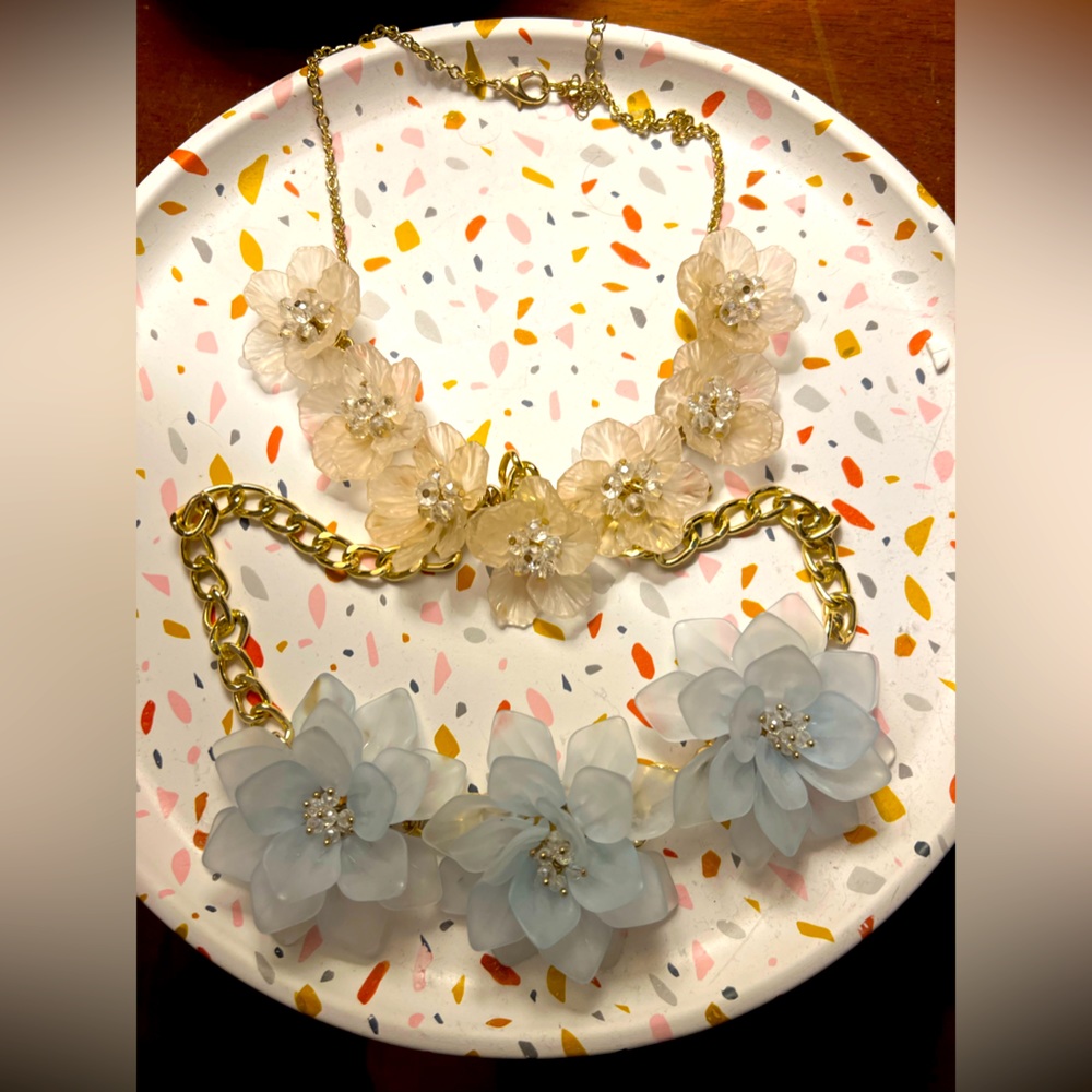 Two beautiful acrylic floral necklaces, perfect for all seasons and occasions.